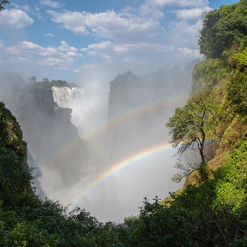 Doppelter Regenbogen über den Viktoria Fällen, Simbabwe