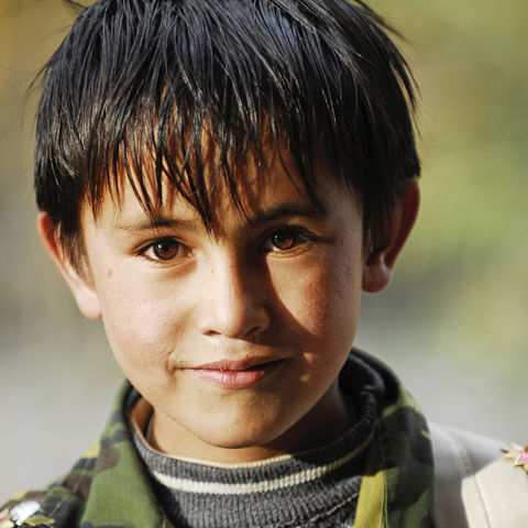 Lächelnder tadschikischer Junge, Tadschikistan